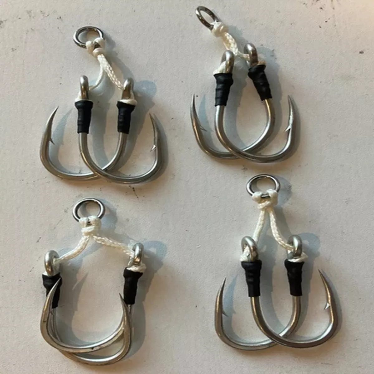 (4) SETS OF SHIMANO FLATFALL ASSIST HOOKS